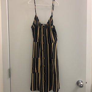 Women’s Xs black, yellow and white striped dress.